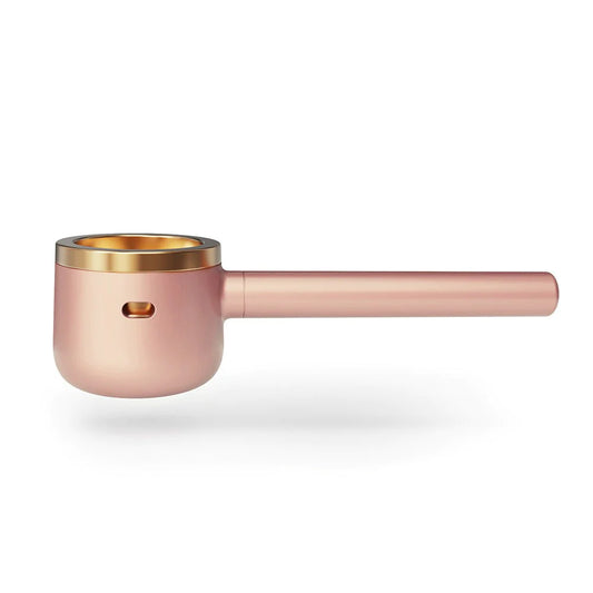 Vessel Pipe the dry herb vaporizer in rose gold color.